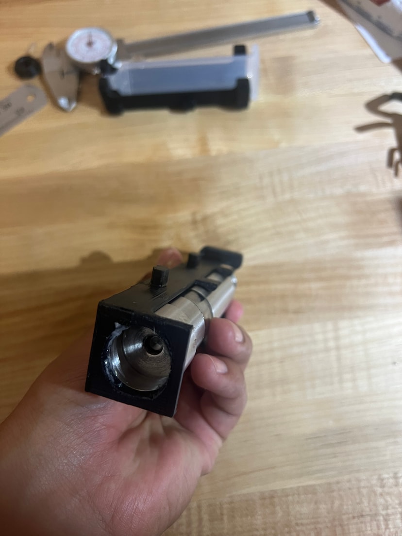 Assembled tool bottom view showing dispensing end